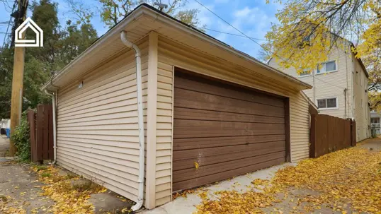 autumn leaves in front of garage